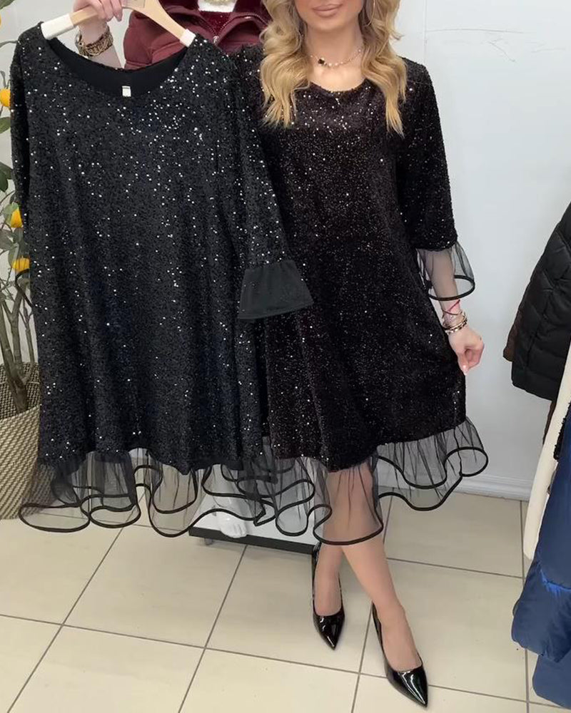 Moderne Kjole Med Utringede Ermer Og Paljetter