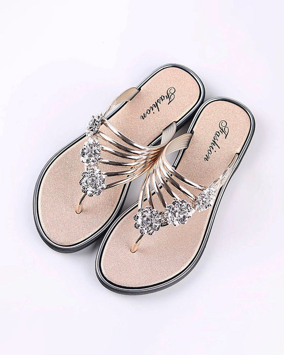 Fasjonable flip-flops med blomster og rhinestone