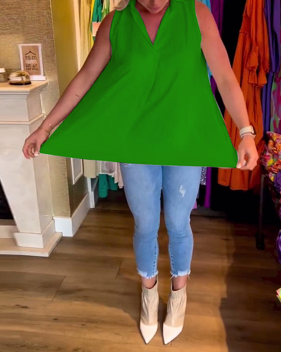 Ermeløs topp med volanger og jakkeslag