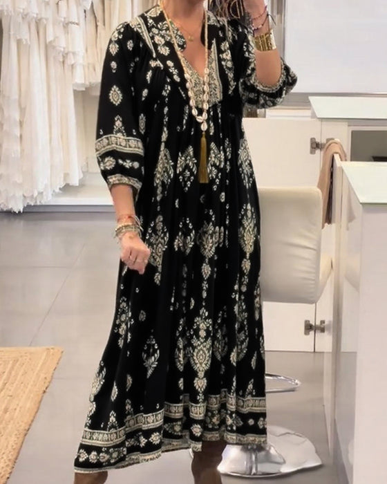 Kjole med avslappet trykk og løse lommer