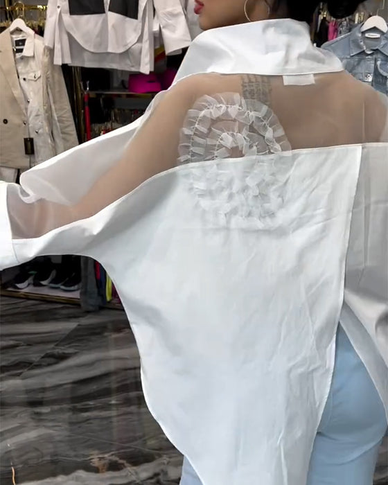 Lapel-blonde med lappeteppe blomsterbluse