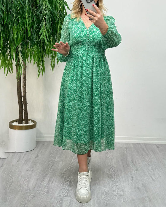 Elegant kjole med trykk med knapper