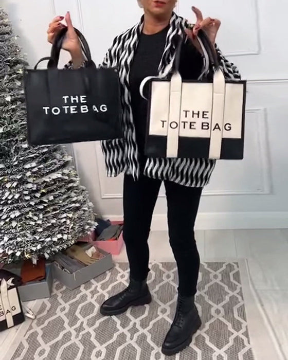 Moteveske med søm I to farger