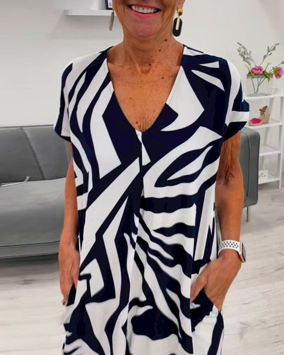 Kortermet kjole med V-hals