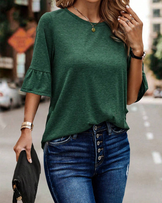 Ensfarget knapp bak elegant topp