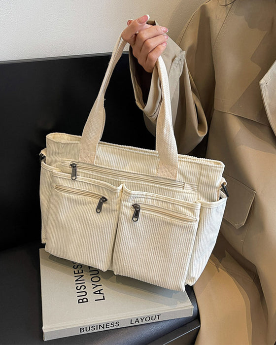 Ensfarget cordfløyelveske