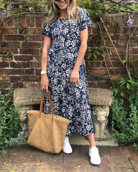 Kortermet lang kjole med blomstertrykk