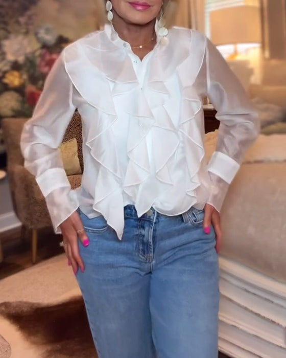 Elegant bluse med ensfarget rysjer
