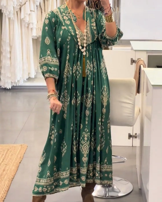 Kjole med avslappet trykk og løse lommer