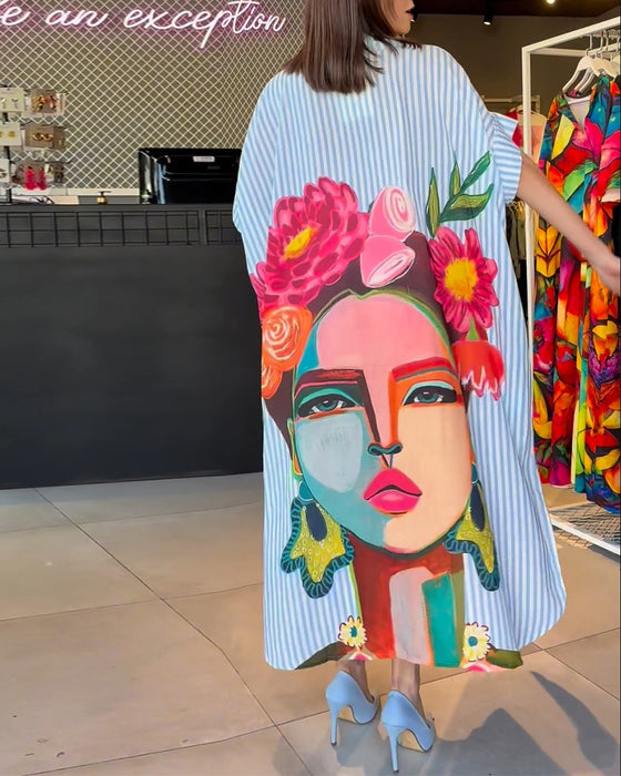 Vertikal stripete jakkeslagsbluse med karaktertrykk