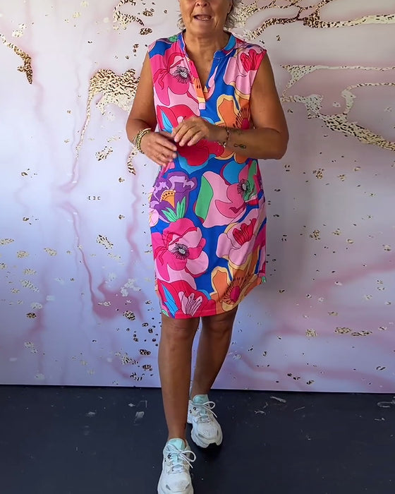 Ermeløs kjole med blomstermønster