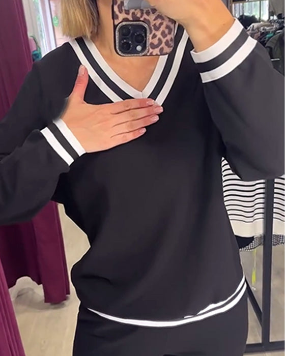 V-hals kontraststripet fritidsdress