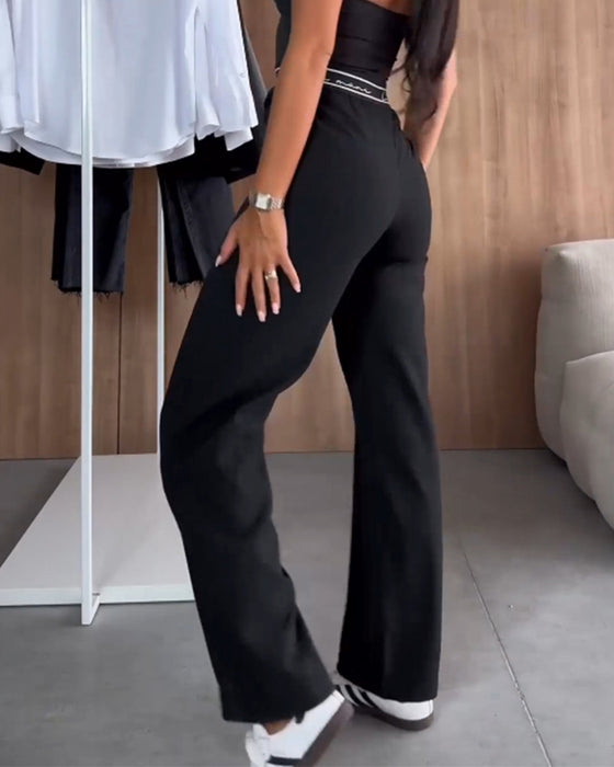 Uformelle ensfargede rette bukser med glidelåslomme