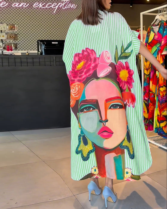 Vertikal stripete jakkeslagsbluse med karaktertrykk