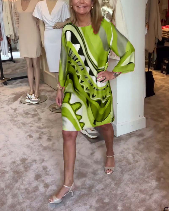 Fasjonabel midi-kjole med rund hals