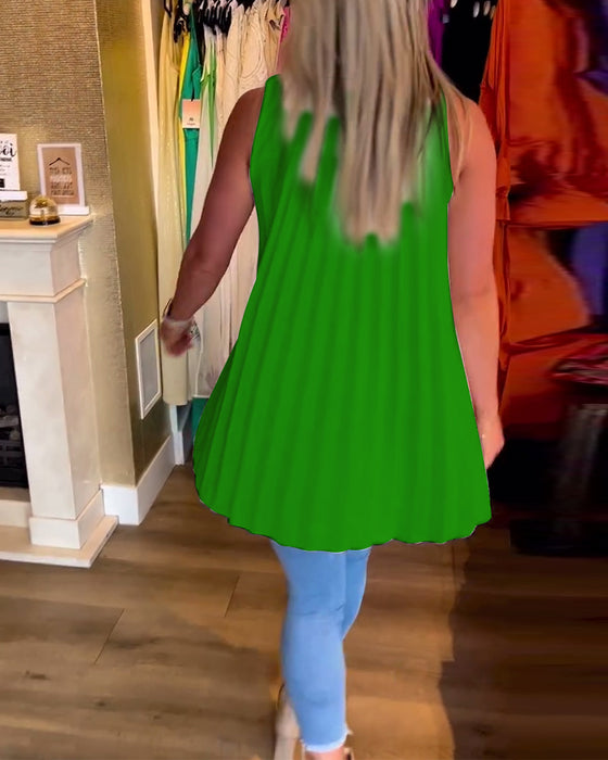 Ermeløs topp med volanger og jakkeslag