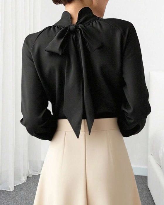 Bluse Med Lanternermer Og Høyt Halsring