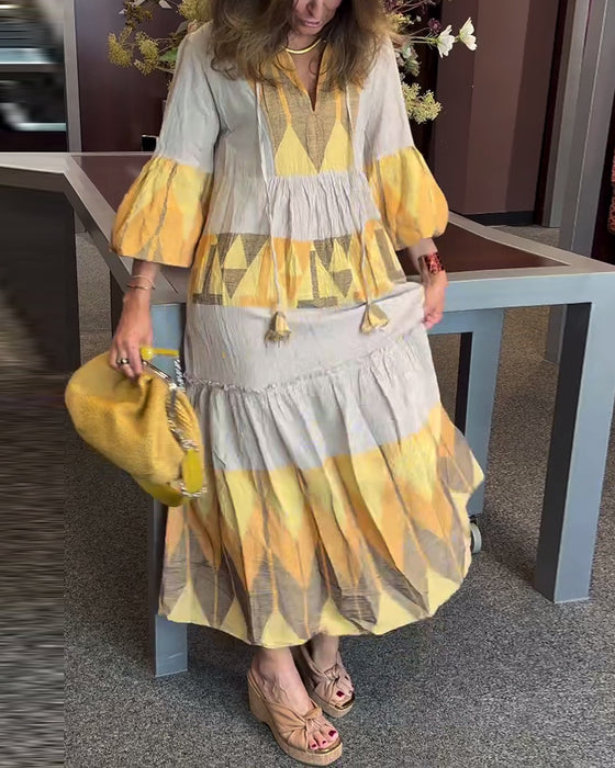 V-hals løs kjole med klokkeermer