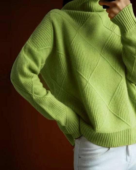 Enkel ensfarget diamantmønster og elegant turtleneck-genser