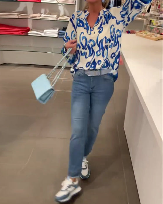 Elegant langermet topp med trykt V-hals