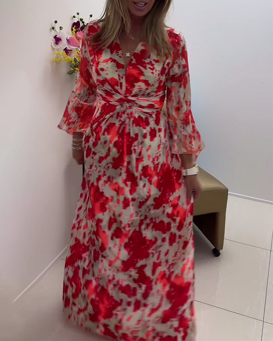 Fasjonabel strikket kjole med trykk med dyp v og klokkeerm