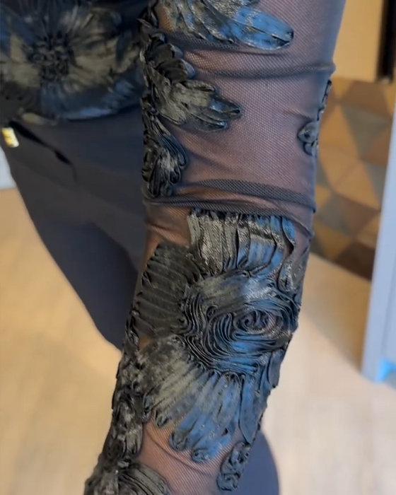 Stilfull Topp Med Rund Hals Og Lange Ermer