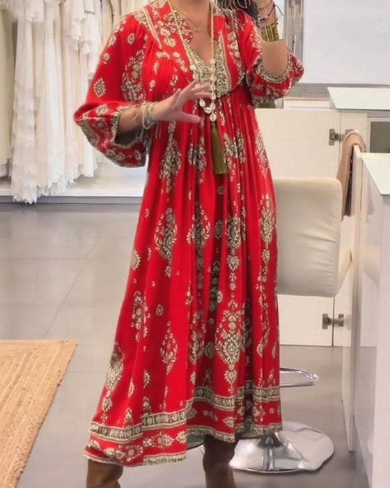 Kjole med avslappet trykk og løse lommer