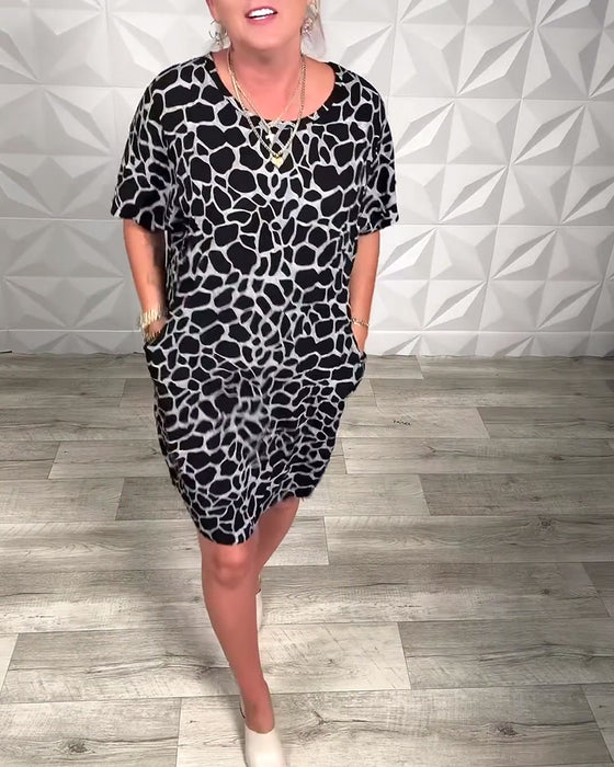 Kjole med rund hals og trykk