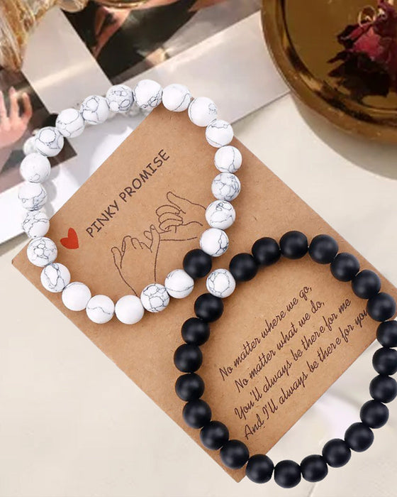 Svart og hvitt perlevevd par armbåndsett