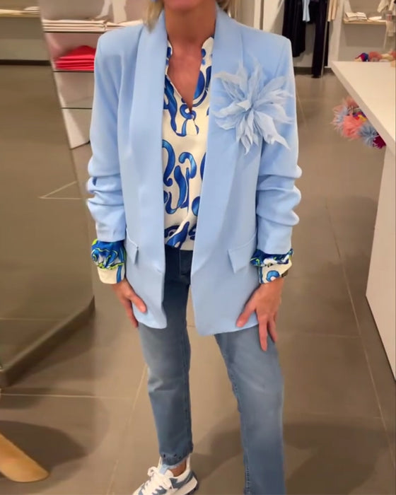 Elegant langermet topp med trykt V-hals