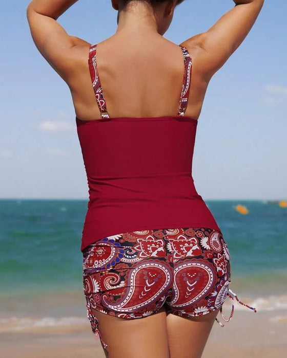 Badedrakt med avslappet trykk og shorts i to deler