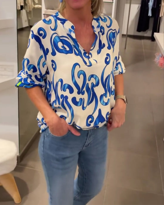 Elegant langermet topp med trykt V-hals