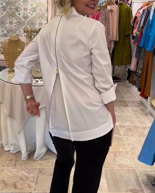 Ensfarget bluse med glidelås