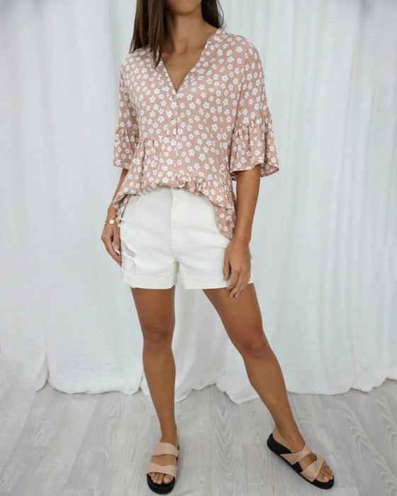 Blomstret bluse med V-hals klokkeermer