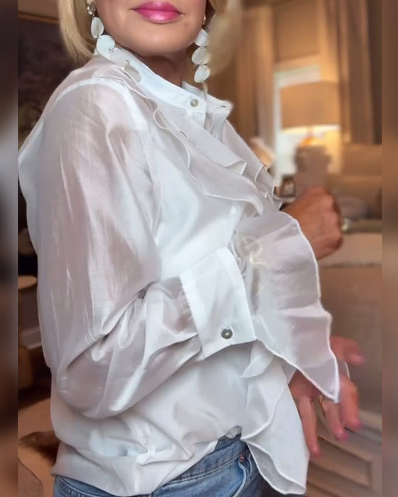 Elegant bluse med ensfarget rysjer