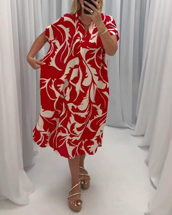 Uformell kjole med slits i kontrasttrykk