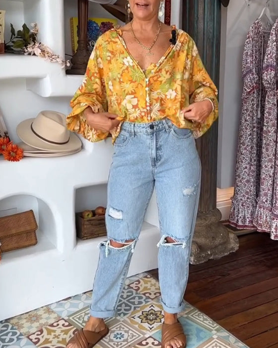 V-hals bluse med blomstertrykk