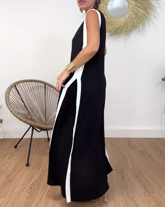 Fasjonabel ermeløs kjole med V-hals i kontrasttrykk