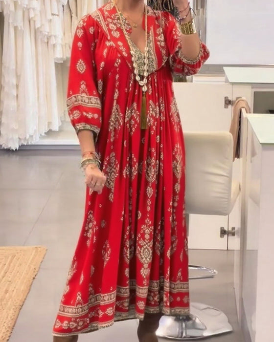 Kjole med avslappet trykk og løse lommer