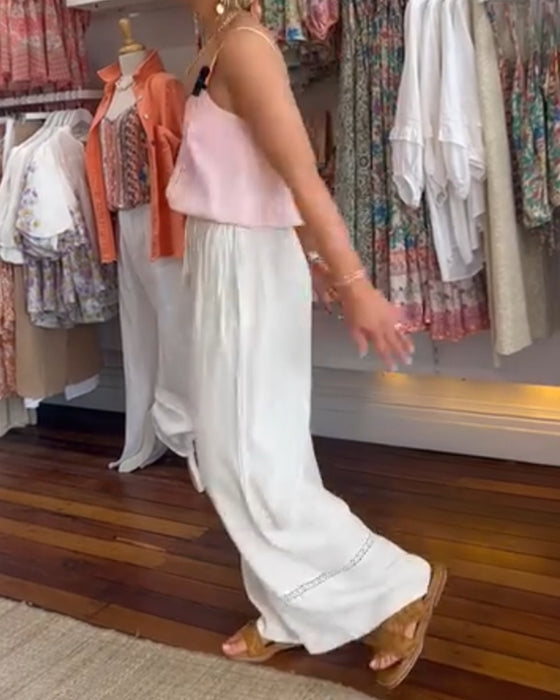 Ensfarget komfortabel bukse med brede ben med lommer