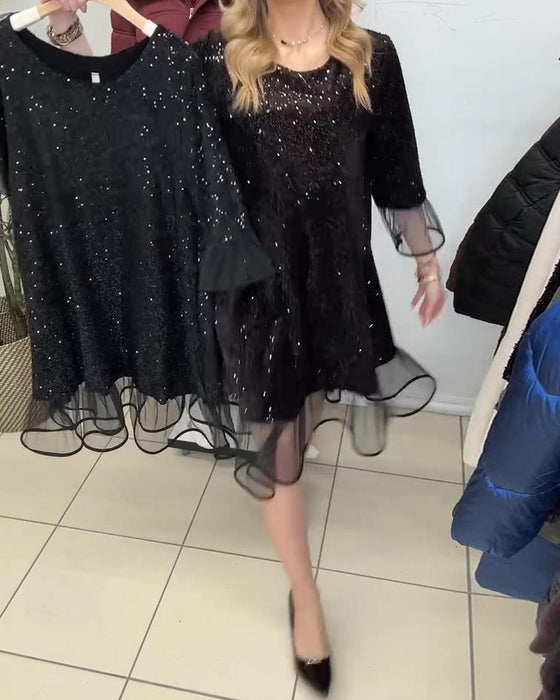 Moderne Kjole Med Utringede Ermer Og Paljetter