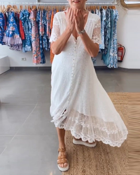 Floy kjole med dyp V og knapper