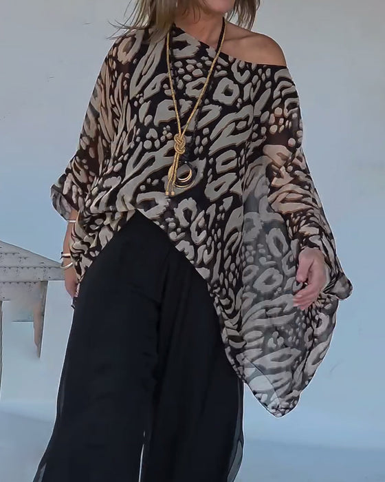 Uregelmessig Bluse Med Flaggermustrykk Og Lange Ermer