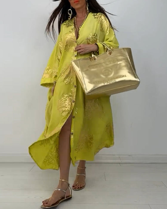 Langermet løs kjole med trykt knapp