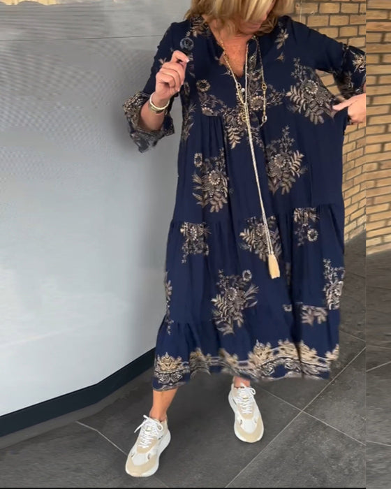 Løs vintagekjole med V-hals