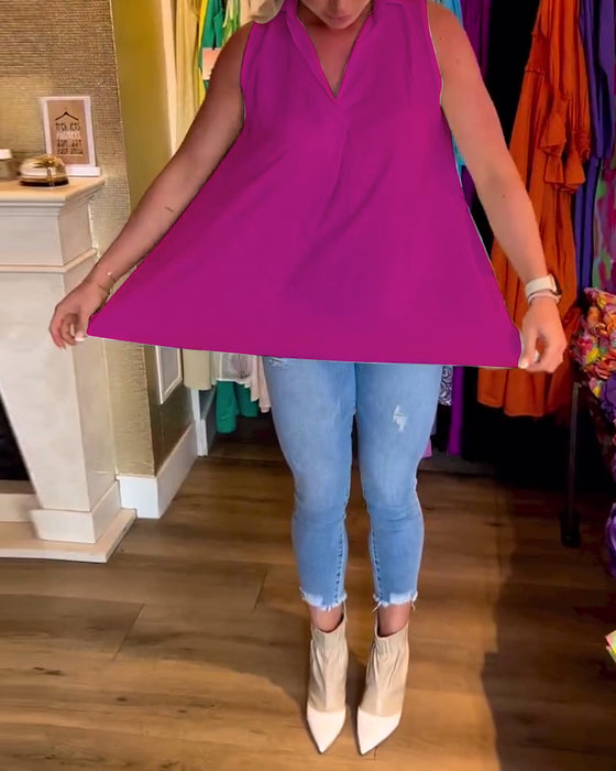 Ermeløs topp med volanger og jakkeslag