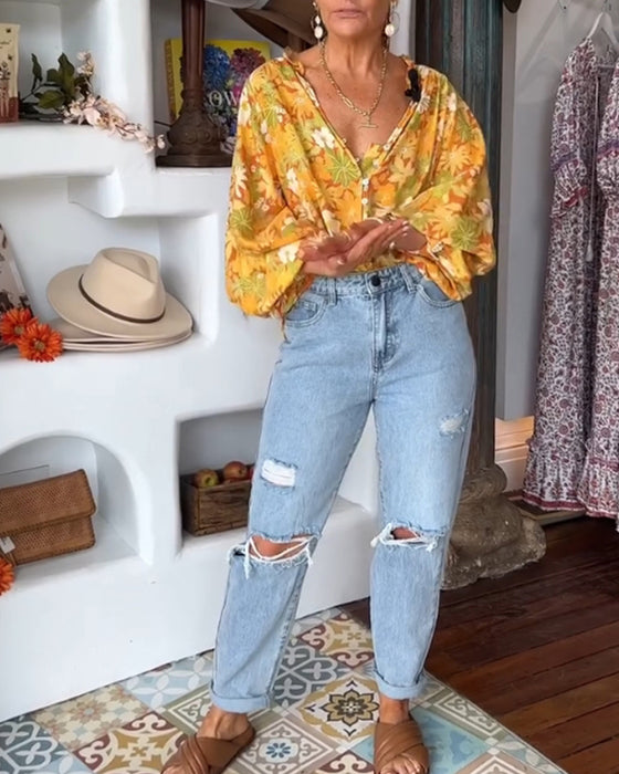 V-hals bluse med blomstertrykk