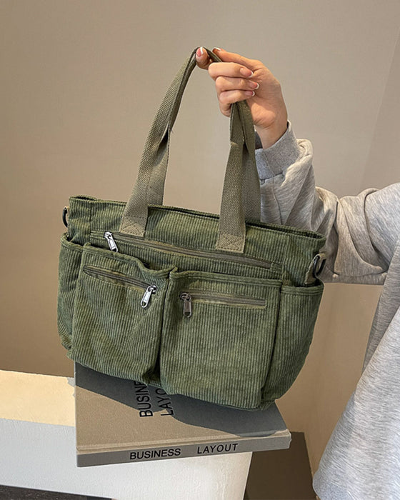 Ensfarget cordfløyelveske