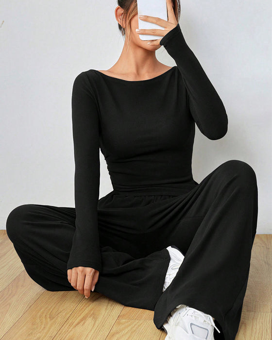 Todelt sett - ensfarget topp og bukser med brede ben