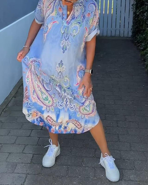 V-hals fold-erme trykt kjole